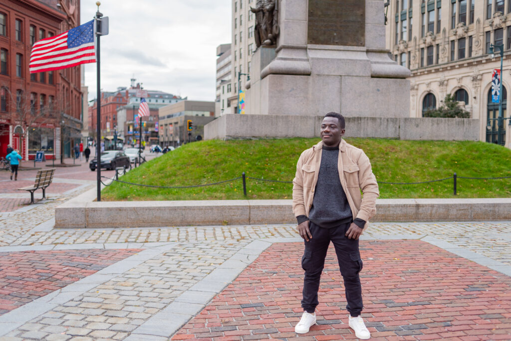 Armando stands in Monument Square in Portland, Maine.